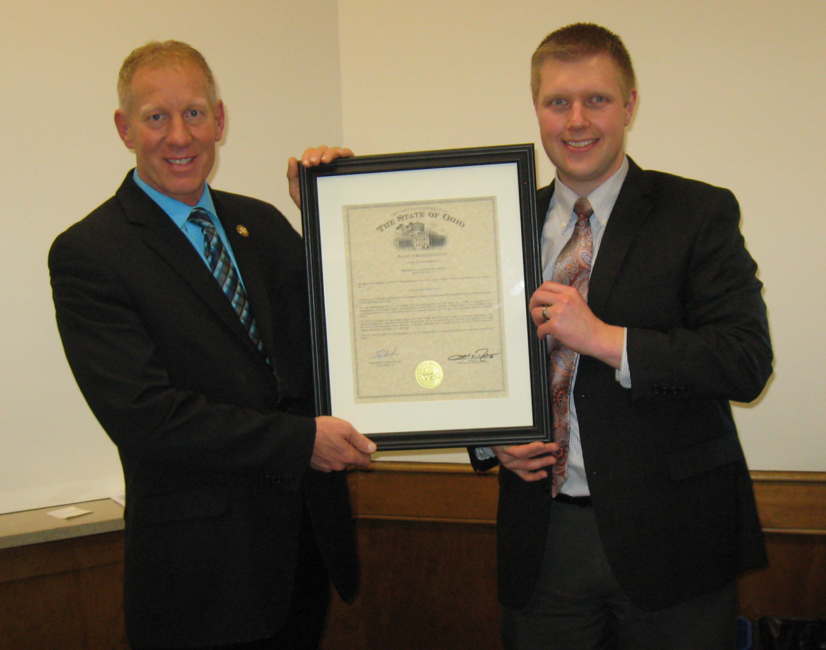 Mayor Walters and Finance Director Bryan Hoffman holding Certificate of Achievement for Excellence in Financial Reporting.