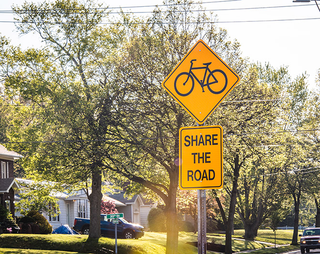 share the road sign